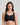 Model wears Comfit Collection Crop Top in BLACK. On body front view