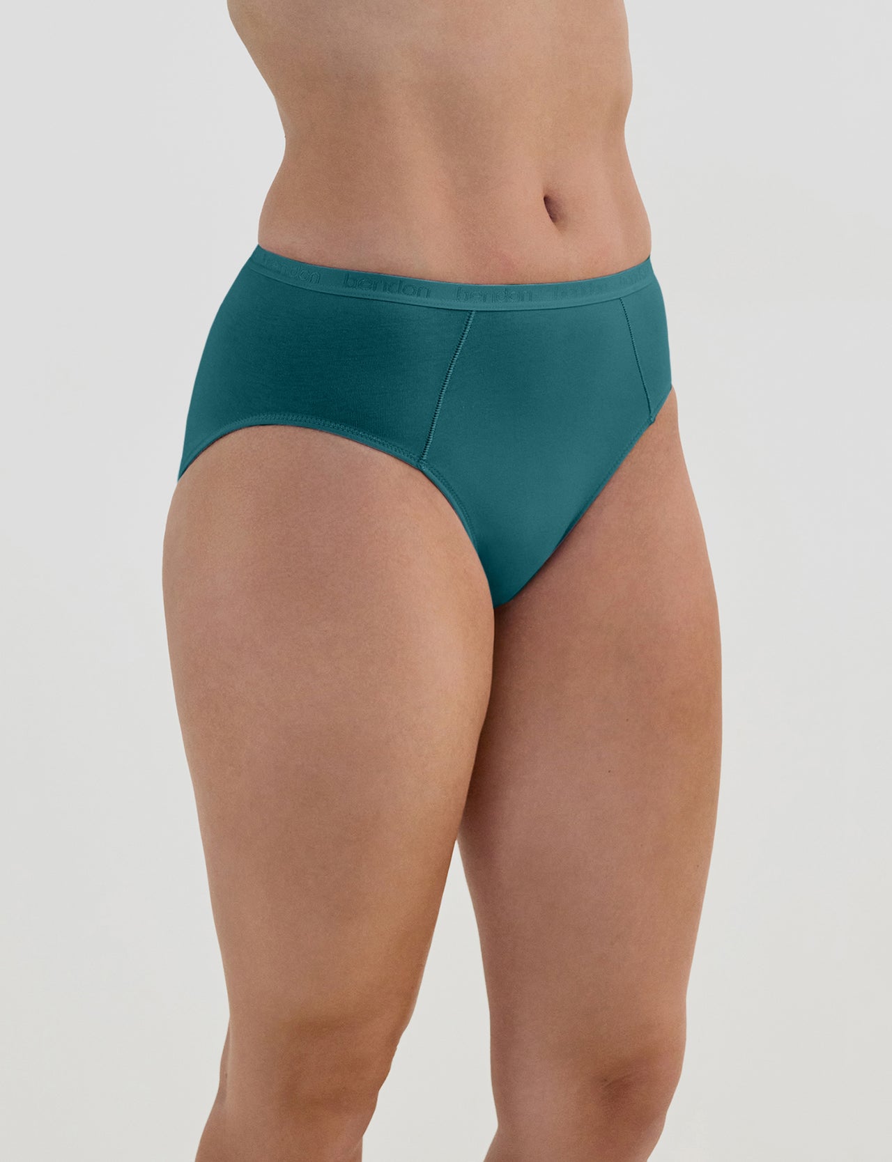 Model wears Body Cotton High Cut Brief in RAIN FOREST. On body side view
