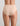 Model wears Extra-Ordinary Full Brief in LATTE. On body back view
