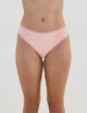 Model wears Stretch Cotton Thong in ICY PINK. On body front view