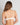 Model wears Morning Lola Underwire Bra in WHITE. On body back view