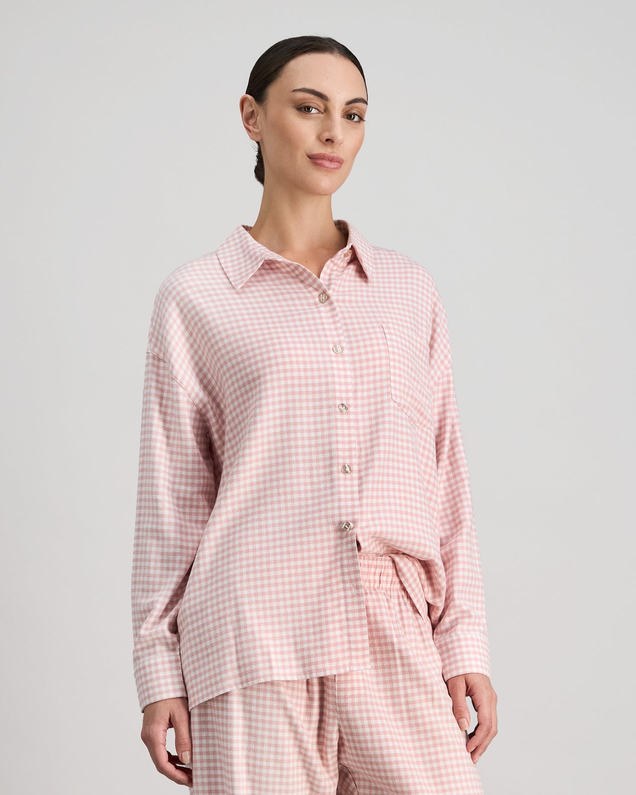 Model wears Cosy Flannel Long Sleeve PJ Top in ROSE MINI GINGHAM. On body side view