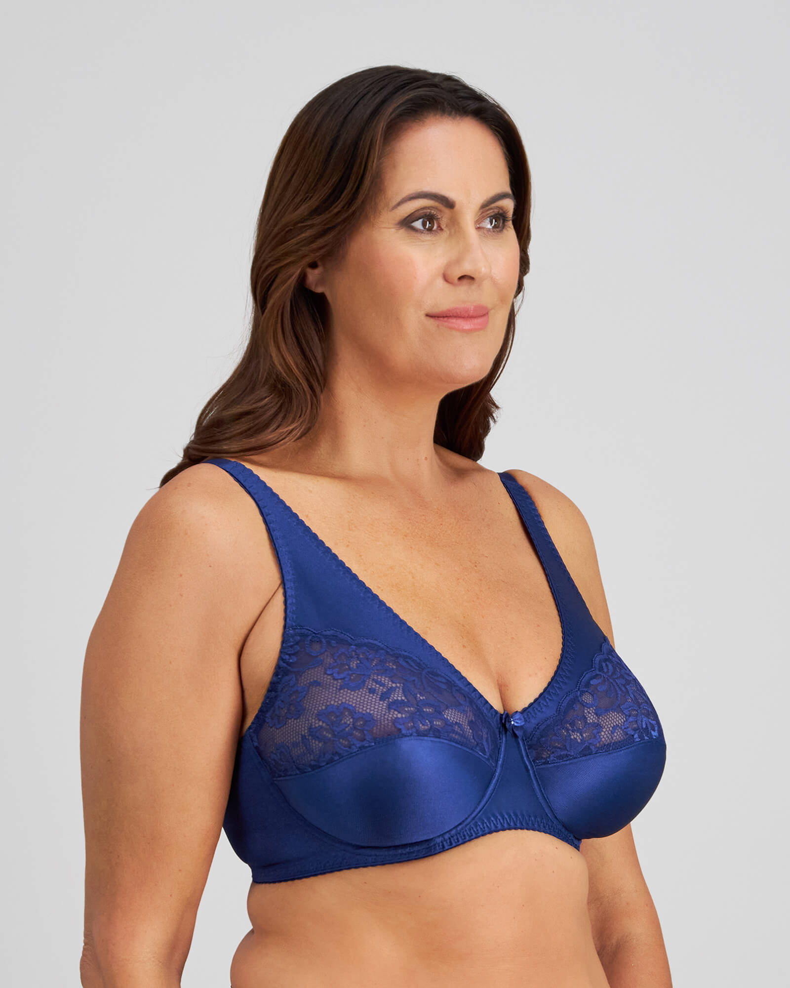 Model wears Classic Underwire Underwire Bra in Medieval Blue. On body side view