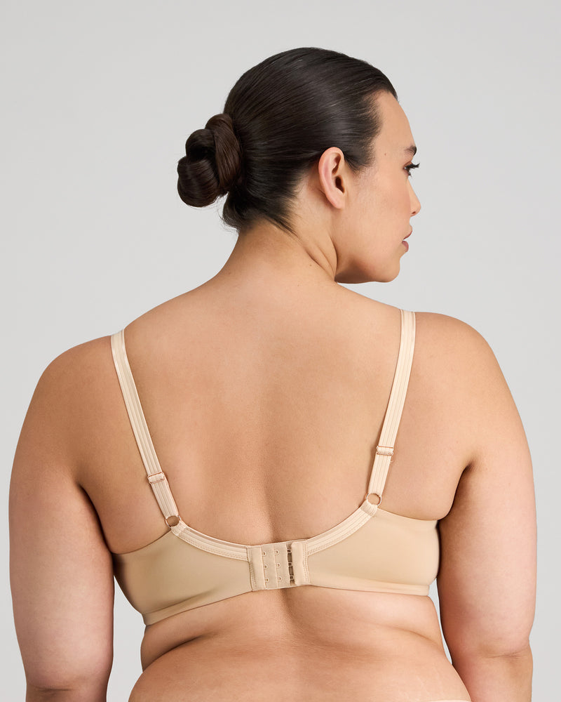 Model wears Sculpt Contour Bra in LATTE. On body back view