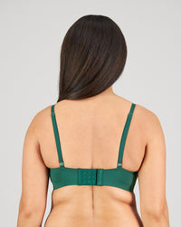 Model wears Comfit Collection Wire Free Bra in RAIN FOREST. On body back view