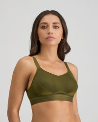 Model wears Bendon Breathe Contour Bra in DARK OLIVE/PINK. On body side view