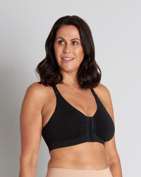 Model wears Bendon Restore Wire Free Front Opening Bra in BLACK. On body side view
