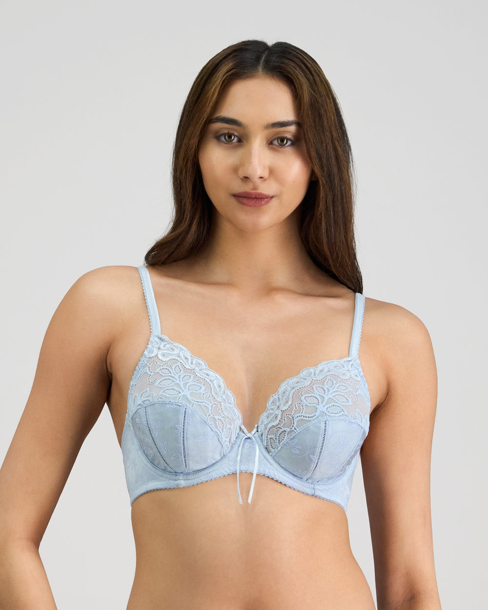 Model wears Yvette Underwire Bra in SKYWAY. On body front view