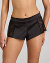 Model wears Lace Impact Short in BLACK. On body front view