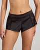 Model wears Lace Impact Short in BLACK. On body front view