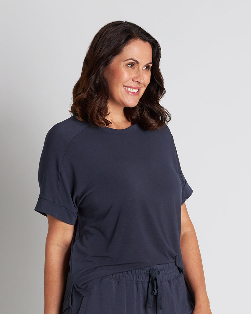 Model wears Sleep-Talk Short Sleeve Top in NIGHT SKY. On body side view