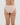Model wears Seamless Soft Bikini in LATTE. On body back view