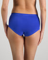 Model wears Seamless Soft Full Brief in DAZZLING BLUE. On body back view