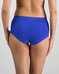 Model wears Seamless Soft Full Brief in DAZZLING BLUE. On body back view