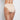Model wears Seamless High Cut Brief in LATTE. On body back view