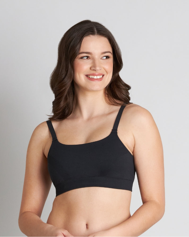 Model wears Balance Wire Free Bra in BLACK. On body front view