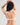 Model wears Alice Contour Bra in WHITE. On body back view