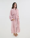 Model wears Cardrona Robe in PALE MAUVE. On body side view