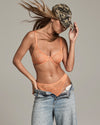 My Fit Underlayer Thong in TANGERINE. Feature shot