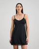 Model wears Understatement Slip in BLACK. On body front view