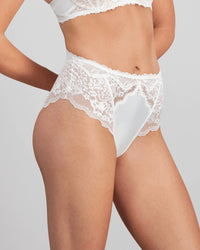 Model wears Shivani High Waisted Brief in SUGAR. On body side view