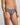 Model wears Cotton Stretch Mens Brief in ASH PINSTRIPE. On body side view