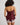 Model wears Sweet Indulgence Cami & Short Set in FIG/PALE LILAC. On body back view
