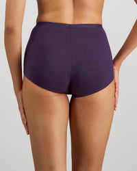 Model wears Body Cotton Full Brief in PURPLE VELVET. On body back view
