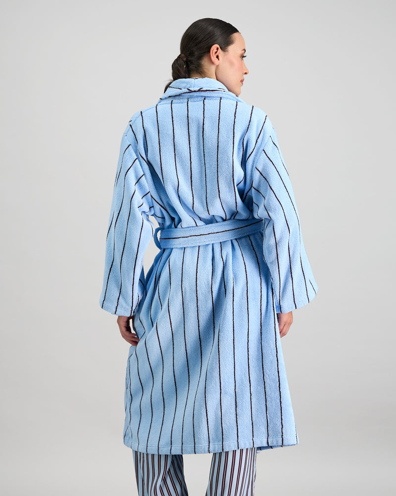 Model wears Riviera Robe in COOL BLUE. On body back view