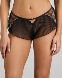 Model wears Oasis Glow French Knicker in BLACK. On body front view