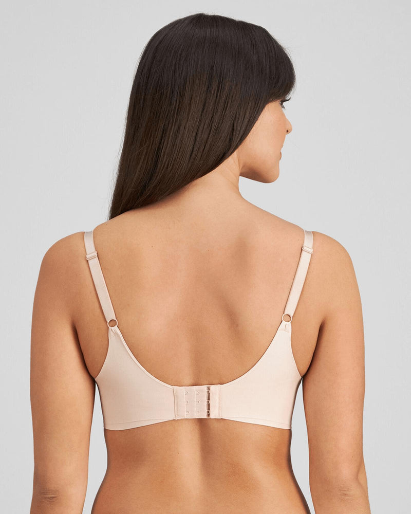 Model wears Flawless Form Contour Bra in LATTE. On body back view