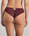 Model wears Sheer Impact Brazilian in FIG. On body back view