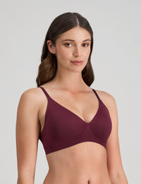 Model wears Comfit Collection Wire Free Bra in FIG. On body side view