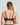 Model wears Felicia Underwire Bra in PONDEROSA PINE. On body back view