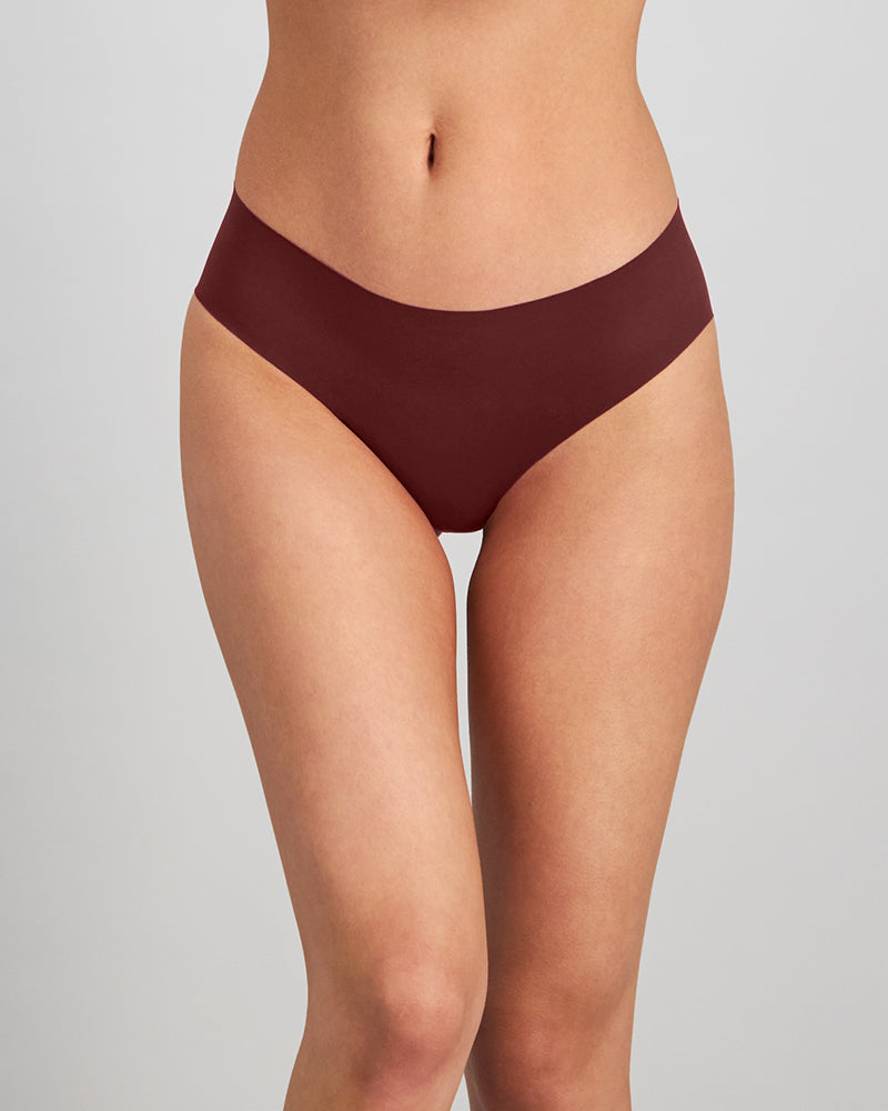 Model wears No Show Bikini in WINDSOR WINE. On body front view