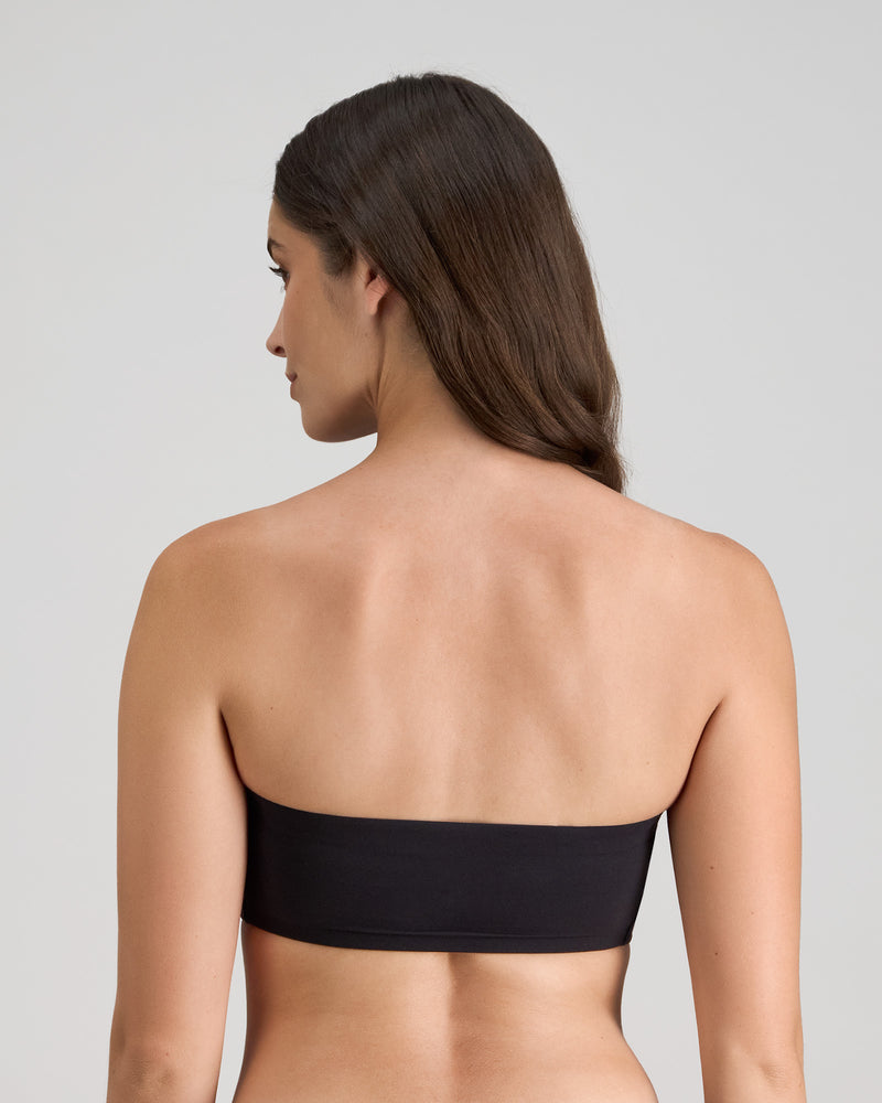 Model wears Extra-Ordinary Bandeau in BLACK. On body back view