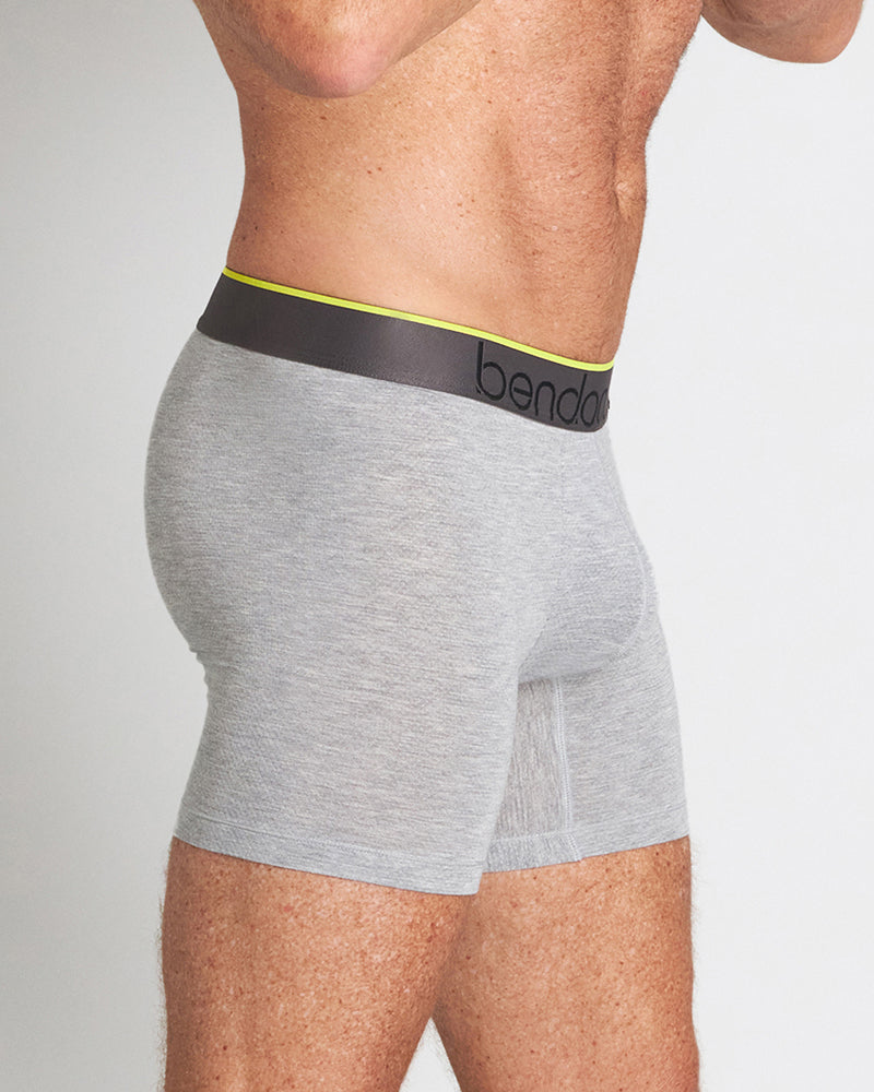 Model wears Everyday Active Mens Trunk in GREY MARL. On body side view