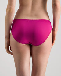 Lacey Bikini in FANTASY FUCHSIA. Flat lay back view