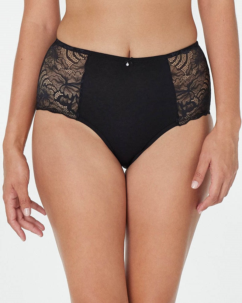 Model wears Embrace Full Brief in BLACK. On body front view