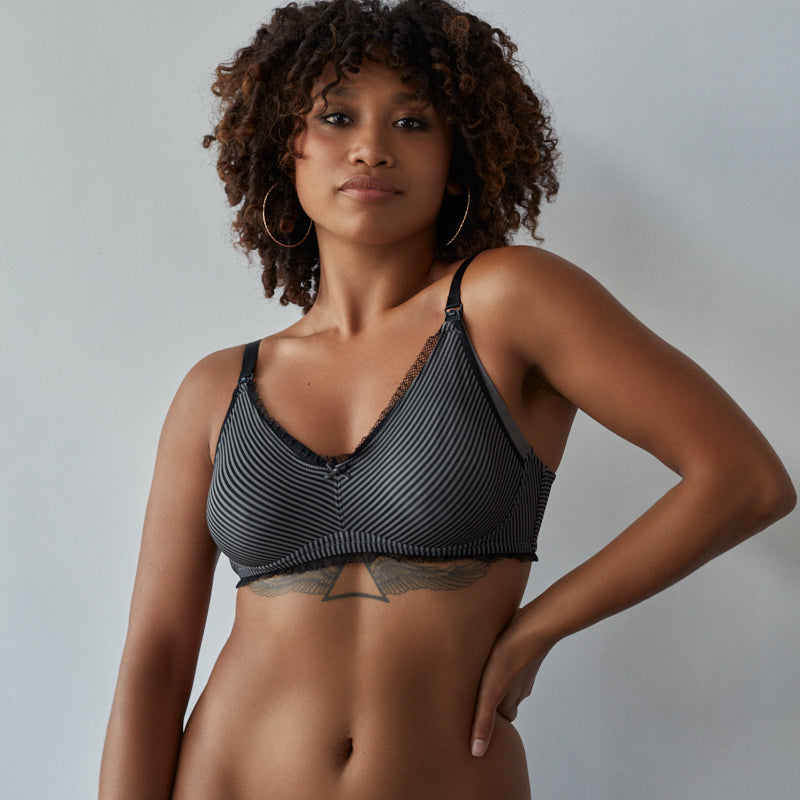 Model wears Elodie Maternity Bra in JET/PEWTER. On body front view
