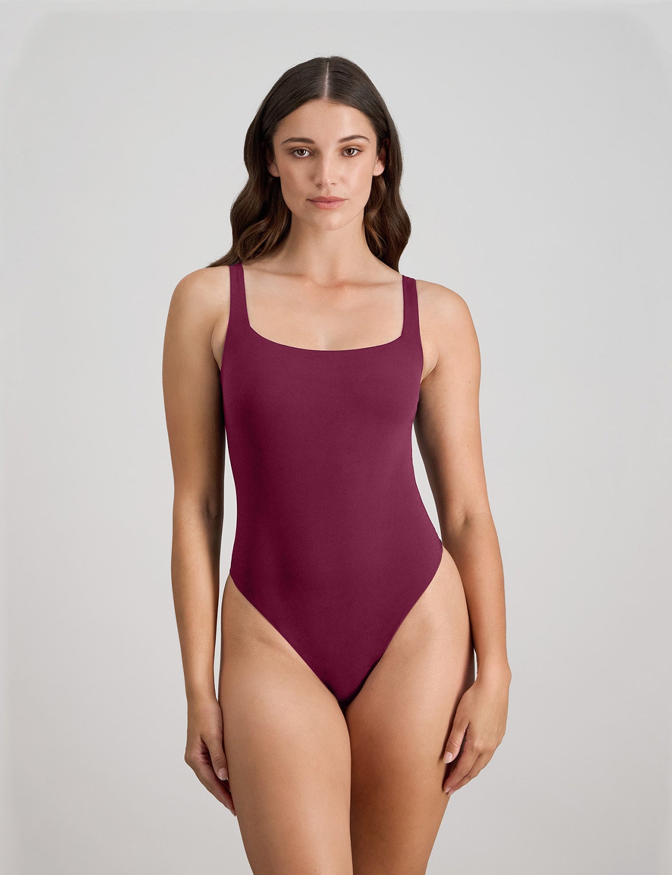 Model wears Extra-Ordinary Bodysuit in FIG. On body front view