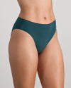 Model wears Au Naturel High Cut Brief in MEDITERRANEA. On body side view