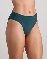 Model wears Au Naturel High Cut Brief in MEDITERRANEA. On body side view