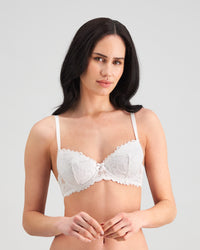 Model wears Alice Contour Bra in WHITE. On body front view