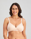 Model wears Bendon Nurture Maternity Bra in LATTE. On body front view