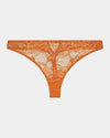 My Fit Underlayer Thong in TANGERINE. Flat lay front view