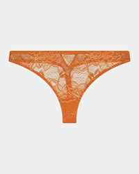 My Fit Underlayer Thong in TANGERINE. Flat lay front view