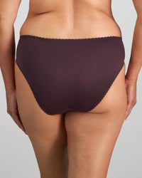 Model wears Vivacious High Cut Brief in PLUM PERFECT/LATTE. On body back view