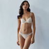 Model wears Stripe Elastic & Papertouch Push Up Bra in SILVER PEONY. On body front view