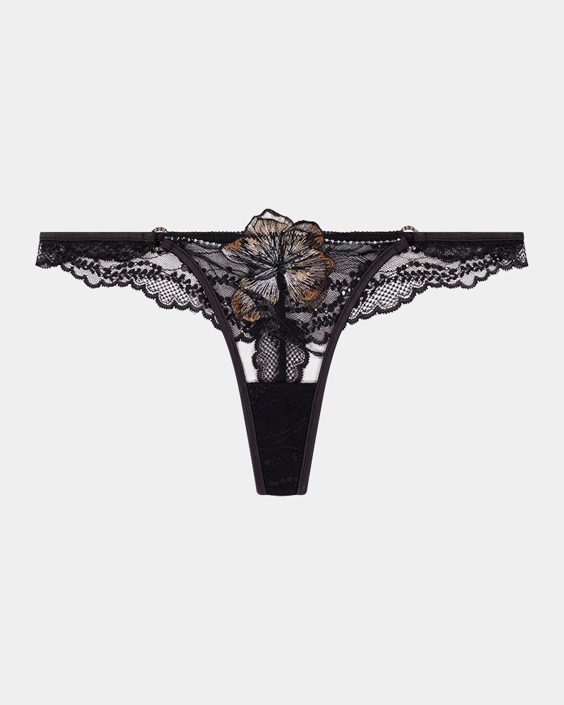 Oasis Glow Thong in BLACK. Flat lay front view